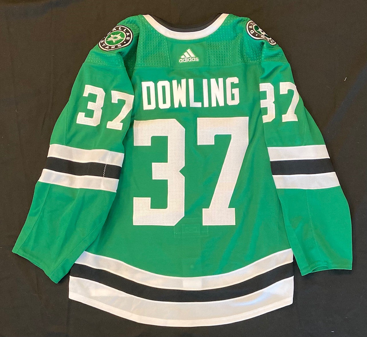 A detailed view of a Dallas Stars jersey is seen in the Dallas
