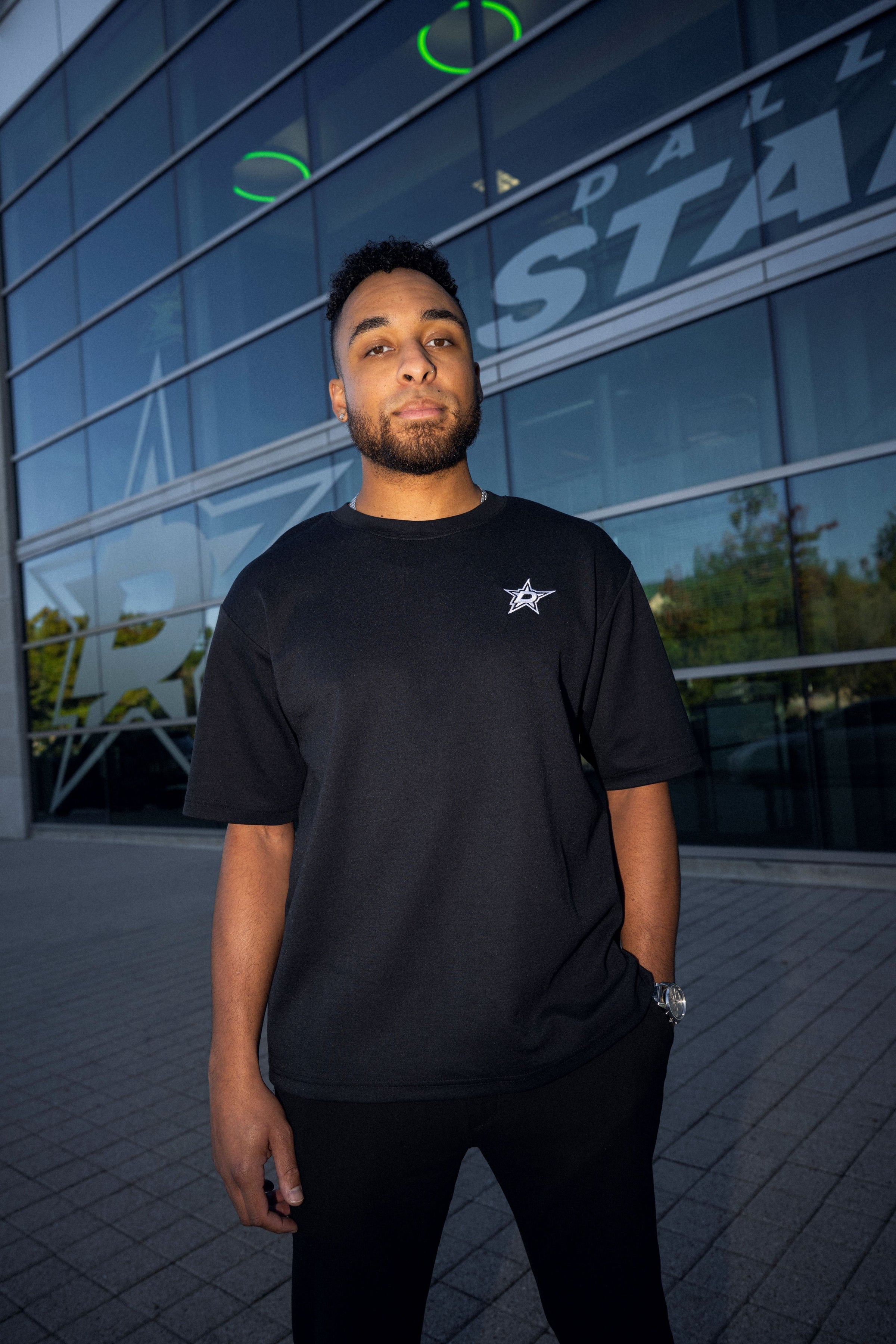 Photo of person wearing a black shirt