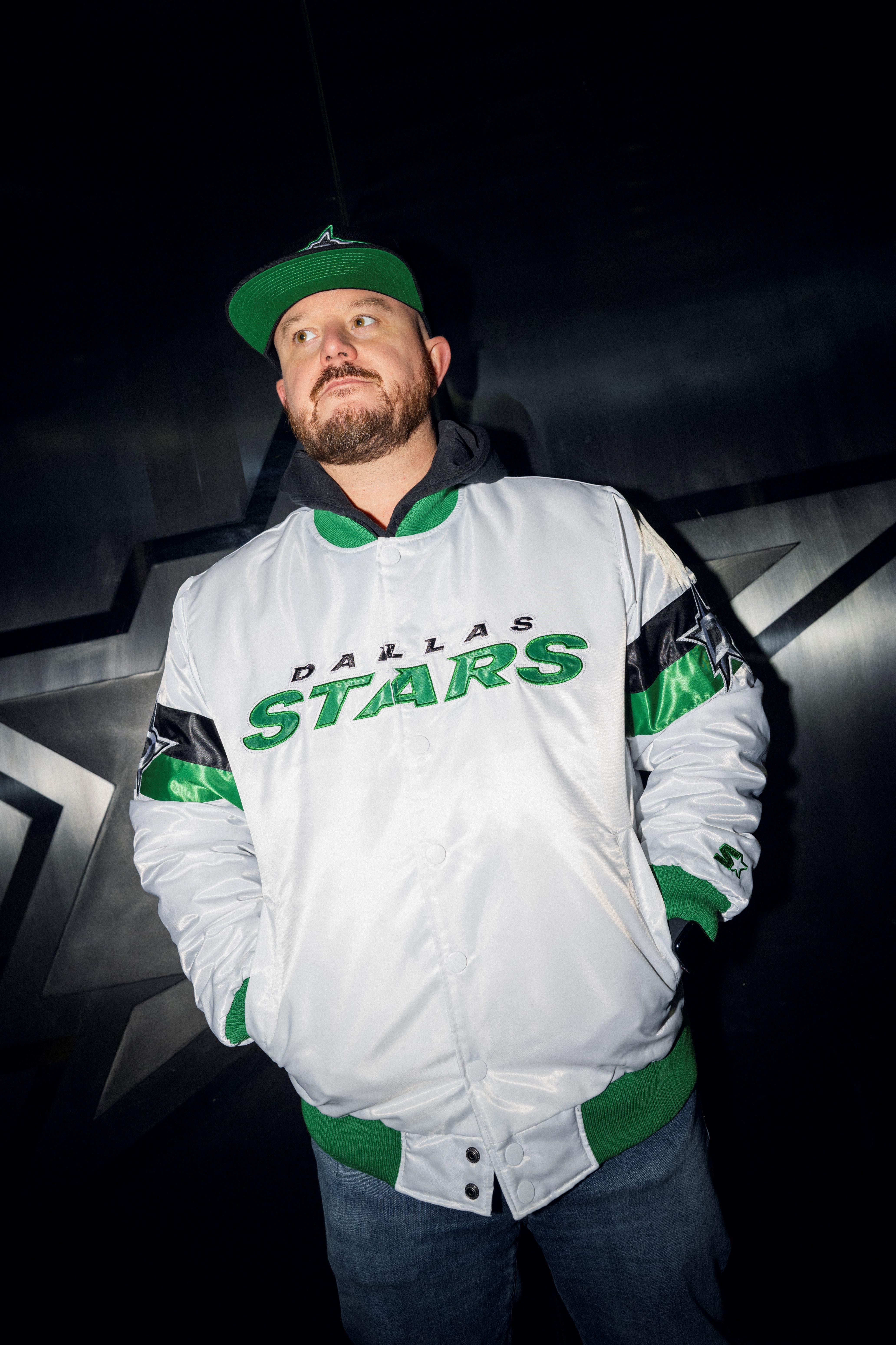 Photo of person wearing a white starter jacket