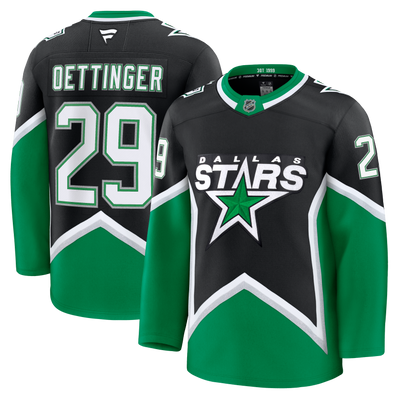 Hockey jersey with 'Dallas Stars' logo and player name 'Oettinger' 