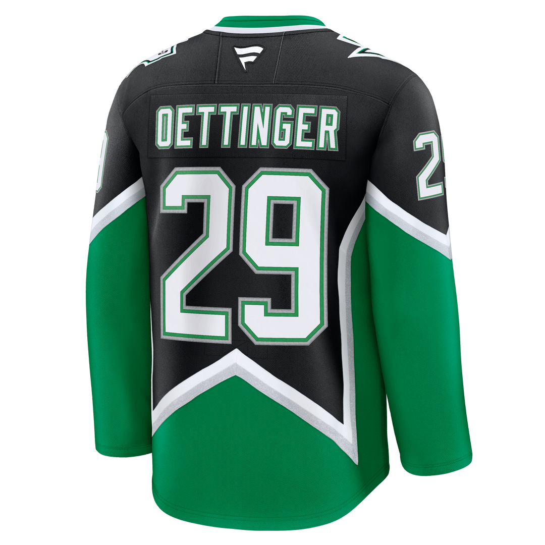 Green and black hockey jersey with &