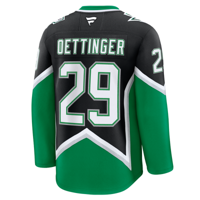 Green and black hockey jersey with 'Oettinger' and number '29'