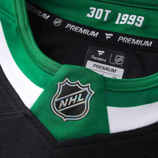 Green hockey jersey with NHL logo and Fanatics branding