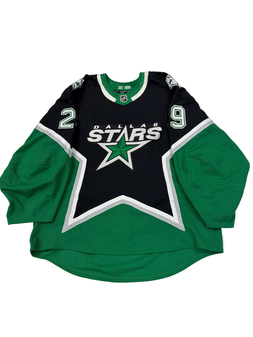 Green and black sports jersey with star logo on a white surface