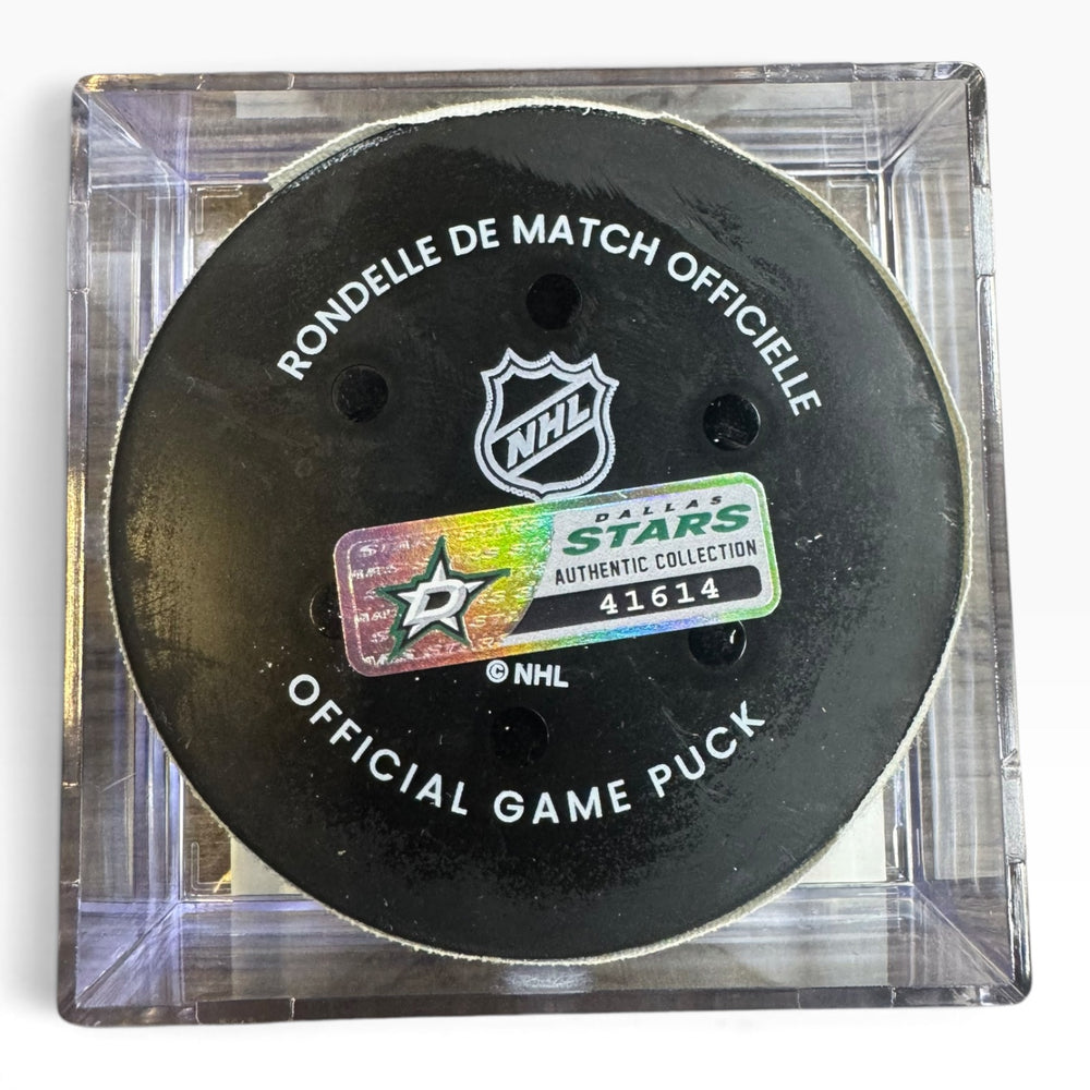 Official Dallas Stars NHL game puck in a clear square display case, featuring the black puck with white text and the Dallas Stars Authentic Collection sticker.