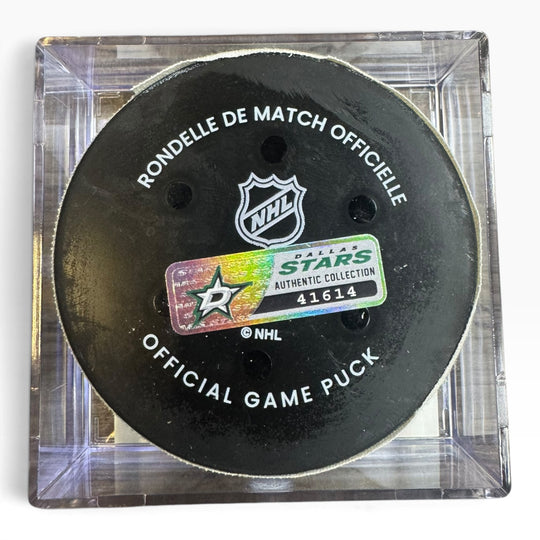 Official Dallas Stars NHL game puck in a clear square display case, featuring the black puck with white text and the Dallas Stars Authentic Collection sticker.