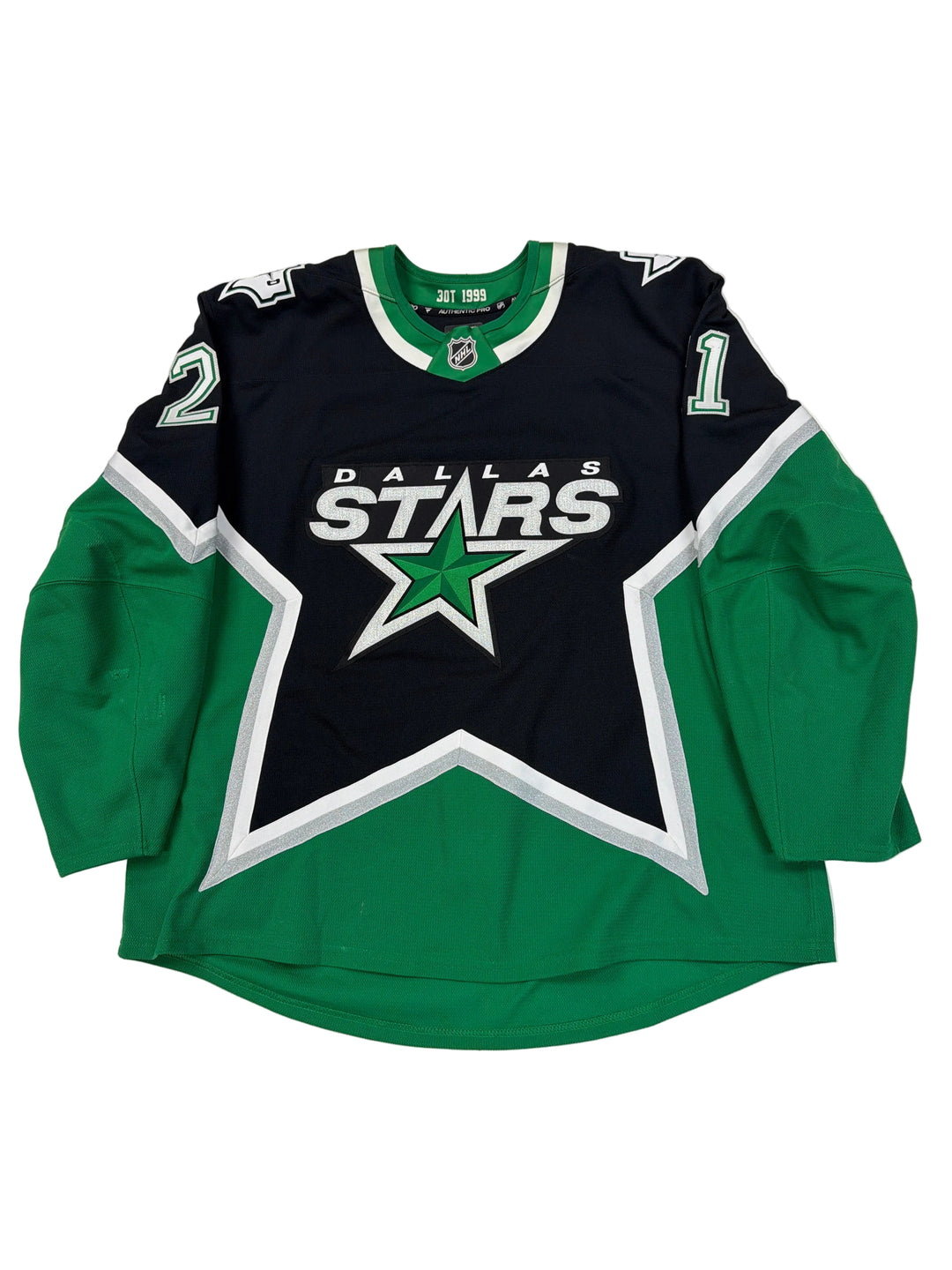 Green and black sports jersey with star logo on a white surface