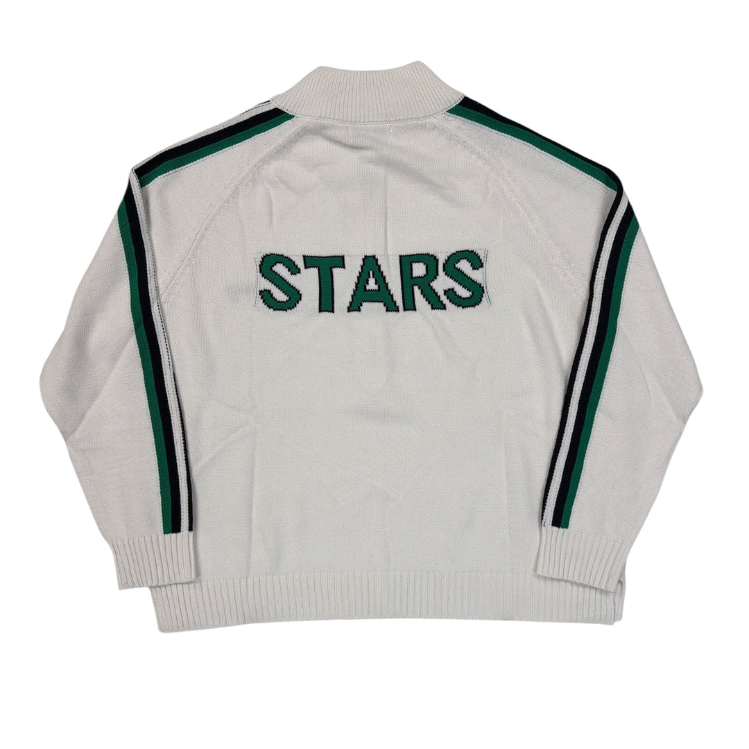 White sweater with green stripes and 'STARS' text on a white background