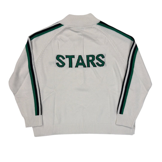 White sweater with green stripes and 'STARS' text on a white background