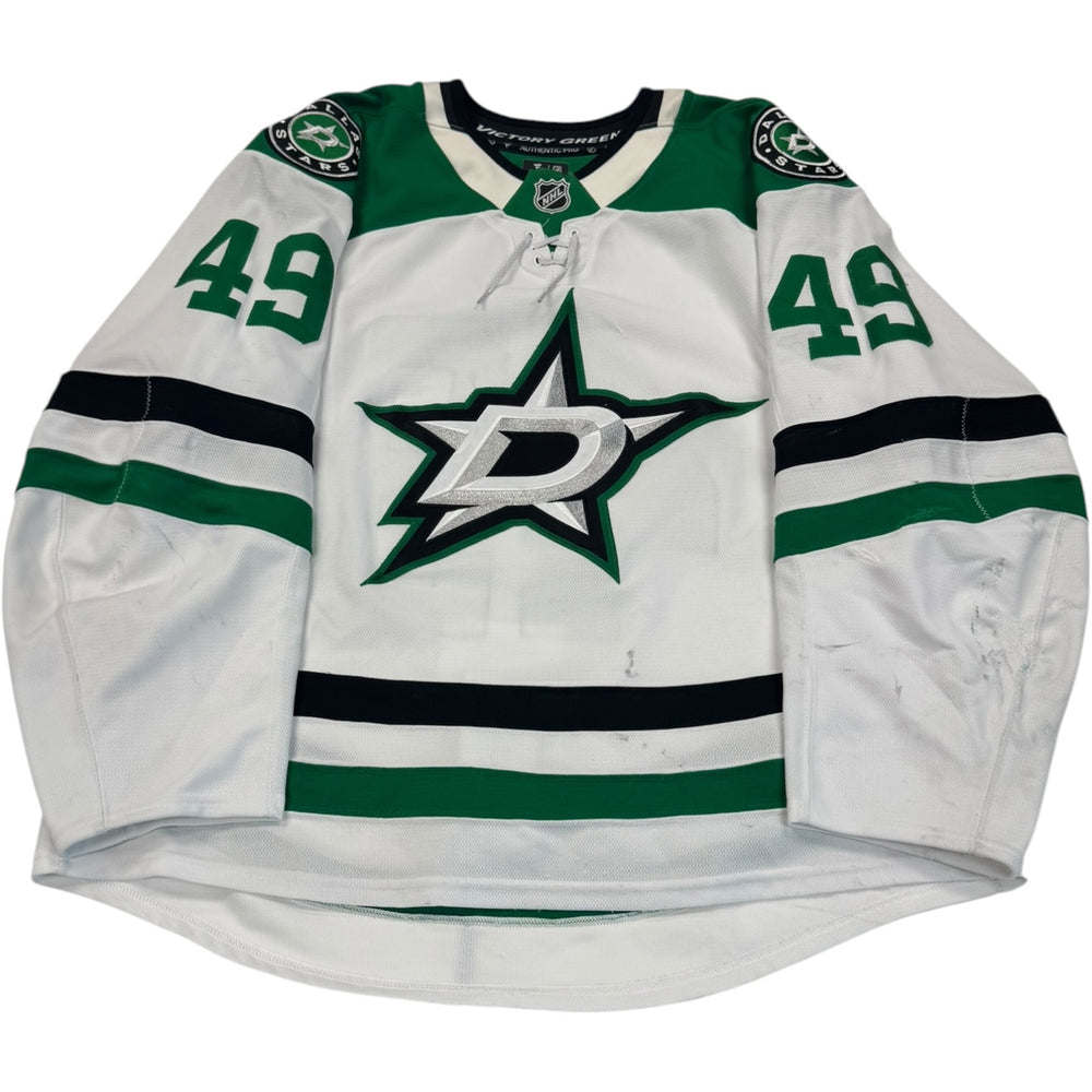 Game worn Dallas Stars Away jersey, number 49 on the sleeves with Dallas Stars logo on the chest. Hockey jersey on a white background