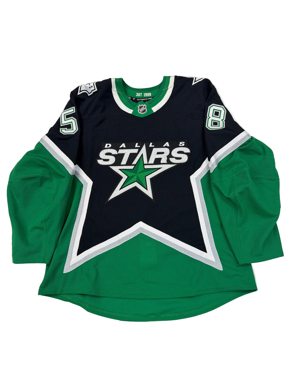 Green and black sports hoodie with star logo on a white surface