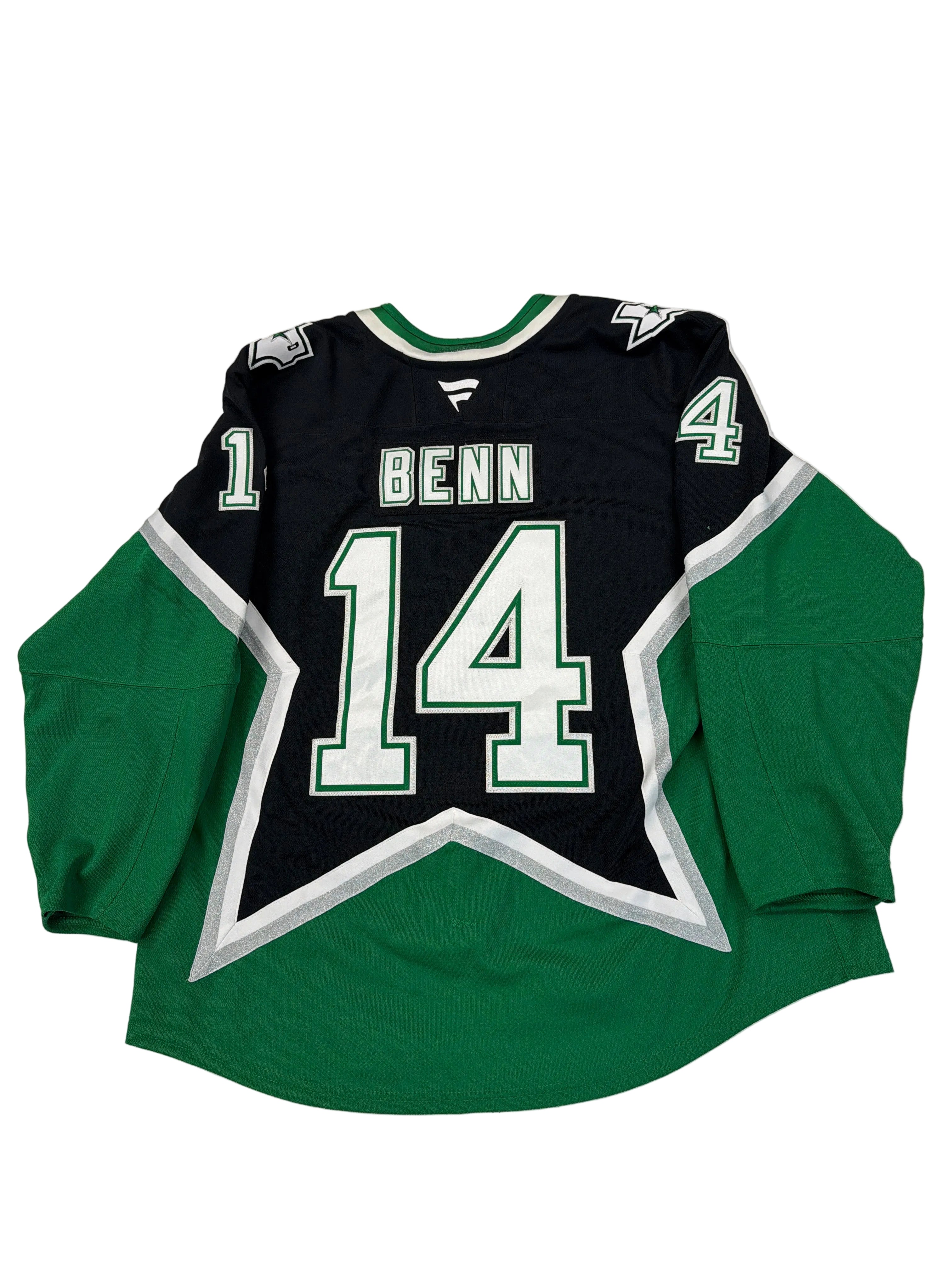 Green and black sports jersey with number 14 on a white surface