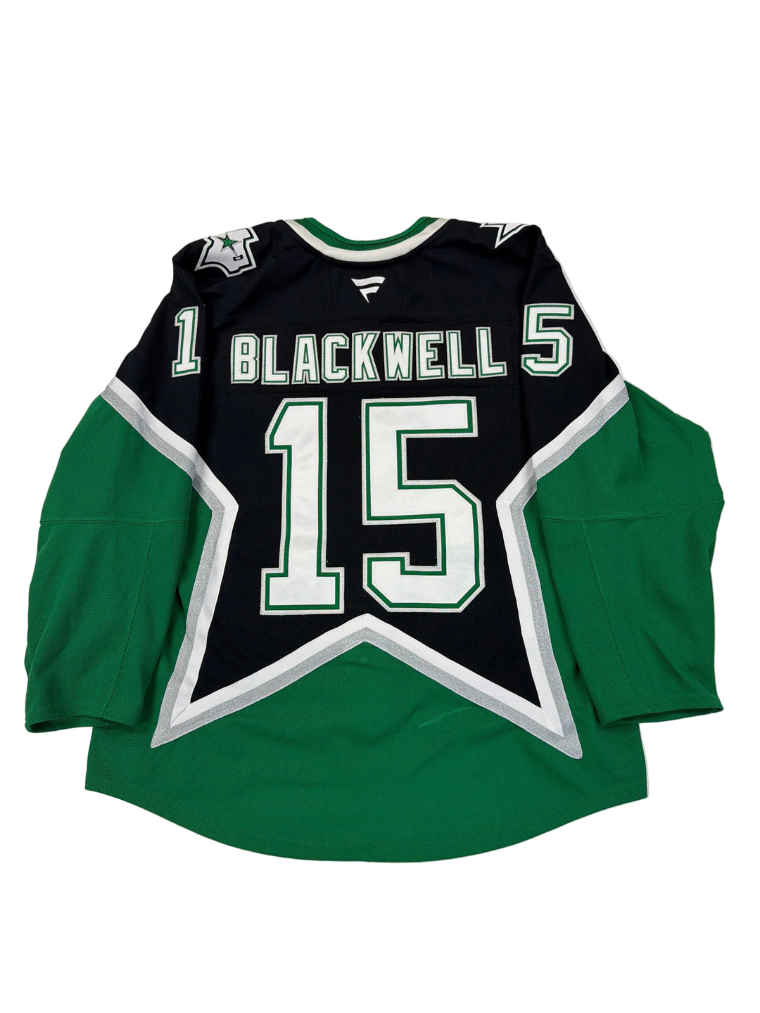 Green and black sports jersey with number 15 and name 'Blackwell' on a white surface.