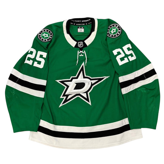 Game Worn Dallas Stars Home hockey jersey with number 25 on sleeves and Stars logo on chest with a white background