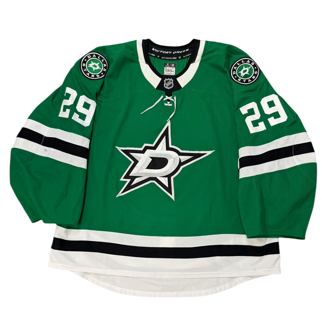 Game Worn Dallas Stars Home hockey jersey with number 29 on sleeves and Stars logo on chest with a white background