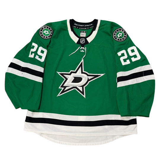 Game Worn Dallas Stars Home hockey jersey with number 29 on sleeves and Stars logo on chest with a white background