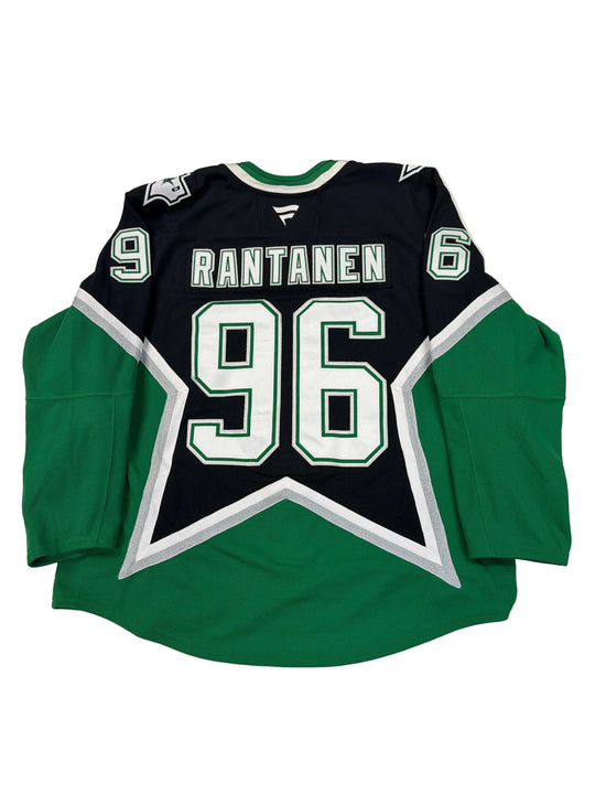Green and black hoodie with number 96 and name 'Rantanen' on a white surface.