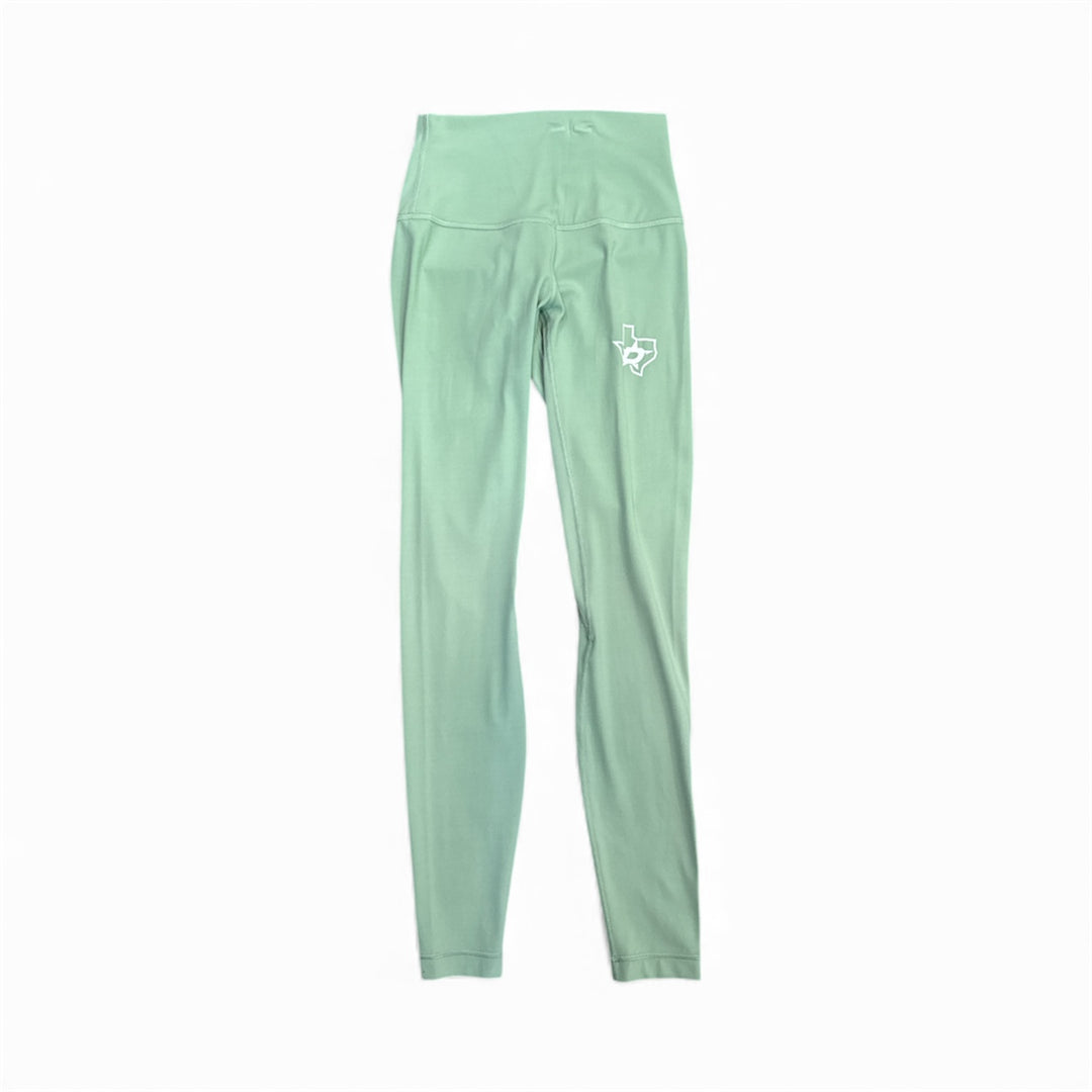 Green leggings with a Dallas Stars logo on a white background