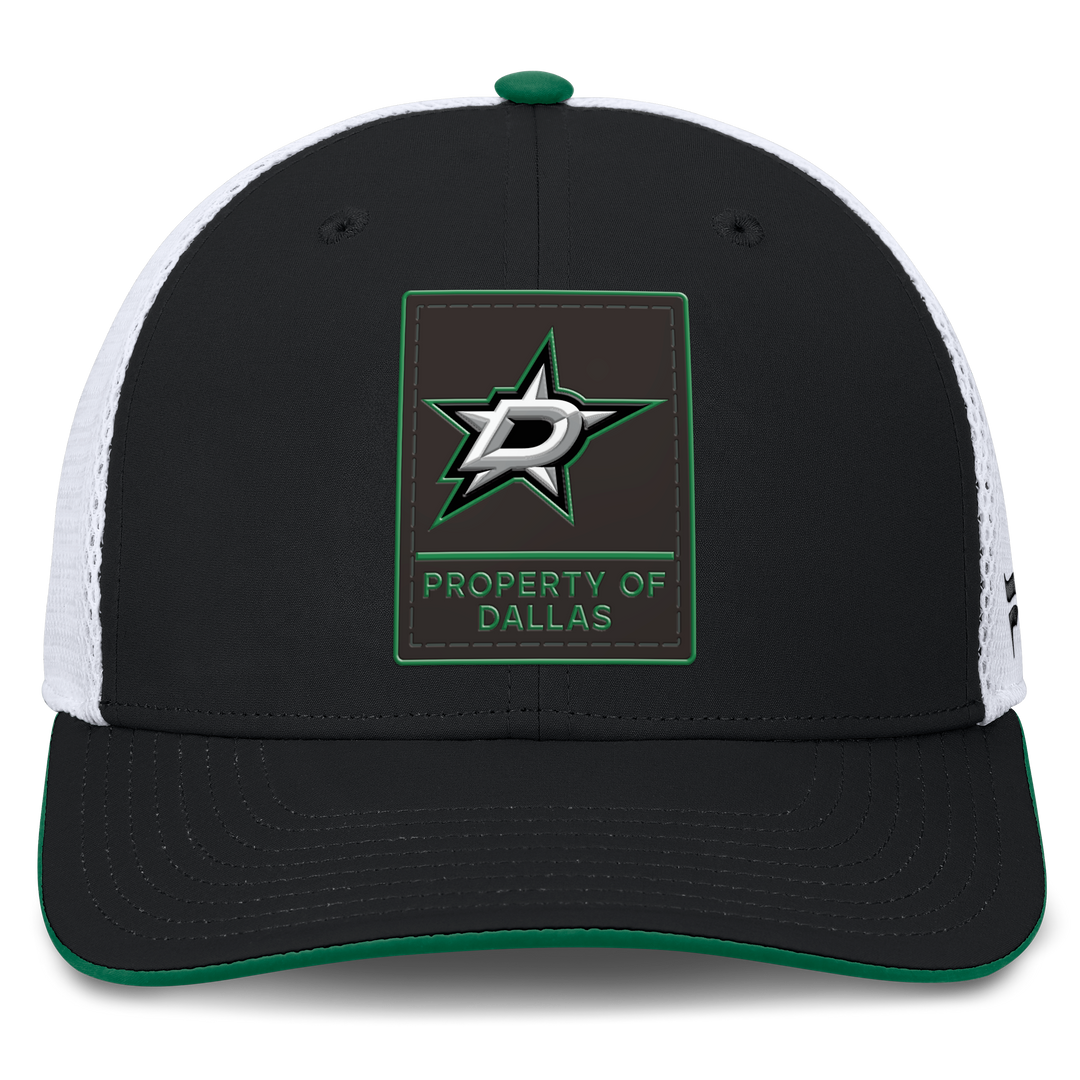 A black and white trucker hat with a Dallas Stars patch on the front. The cap features a black front panel, a green and white star logo, and the text &