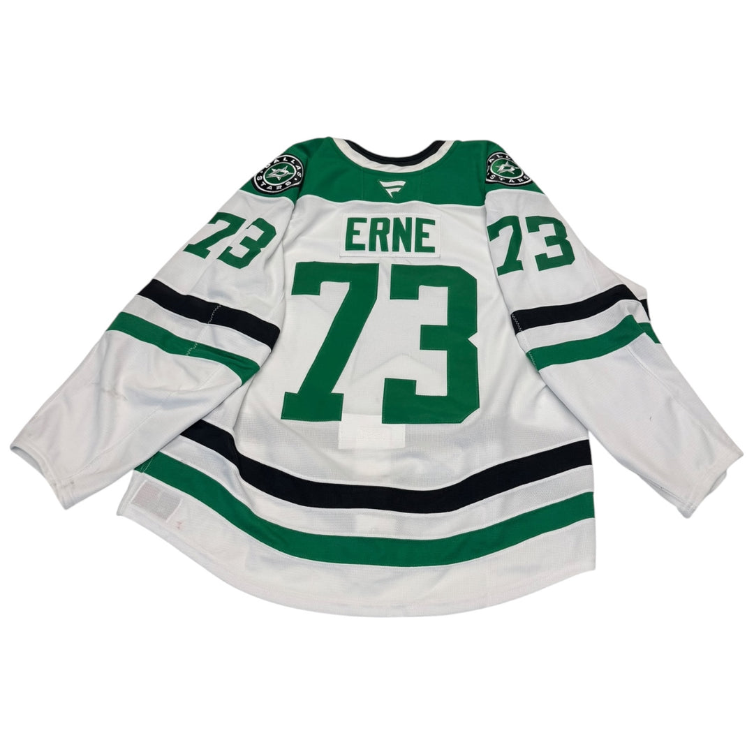 Game worn Dallas Stars away jersey with number 73 and name 'Erne'. Jersey  on a white background