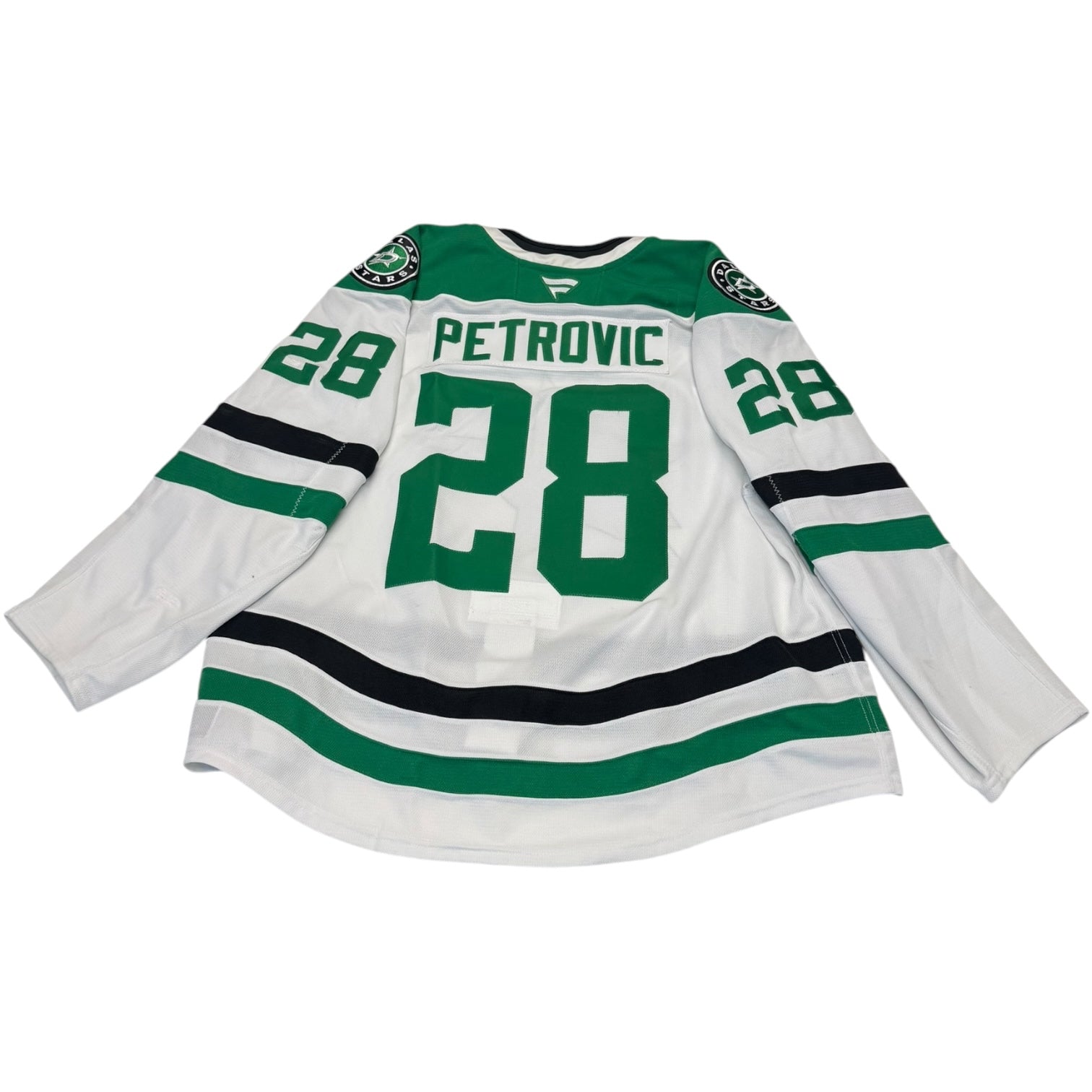Game Worn Dallas Stars away jersey with number 28 and name 'Petrovic' on a white background
