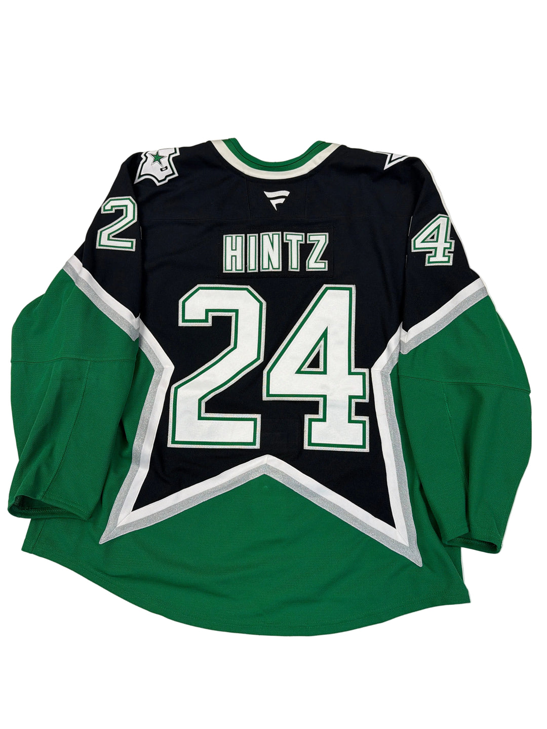 Green and black sports jersey with number 24 and name 'HINTZ' on a white surface.