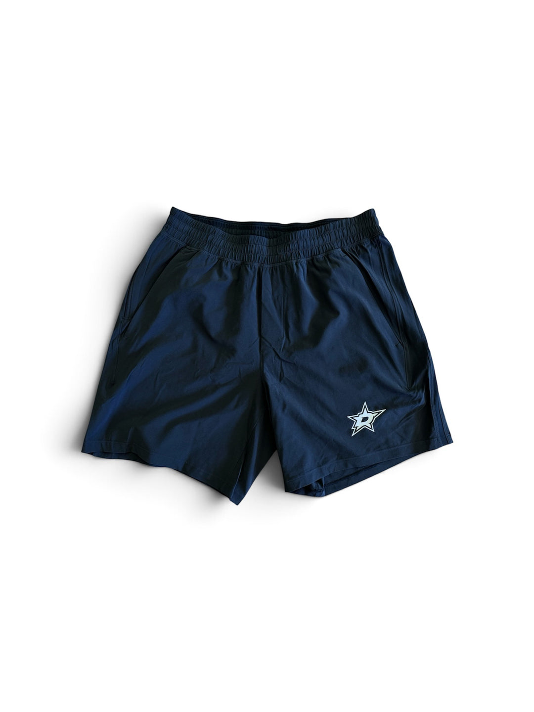 BLACK LULULEMON PACE BREAKER SHORT ON WHITE BACKGROUND