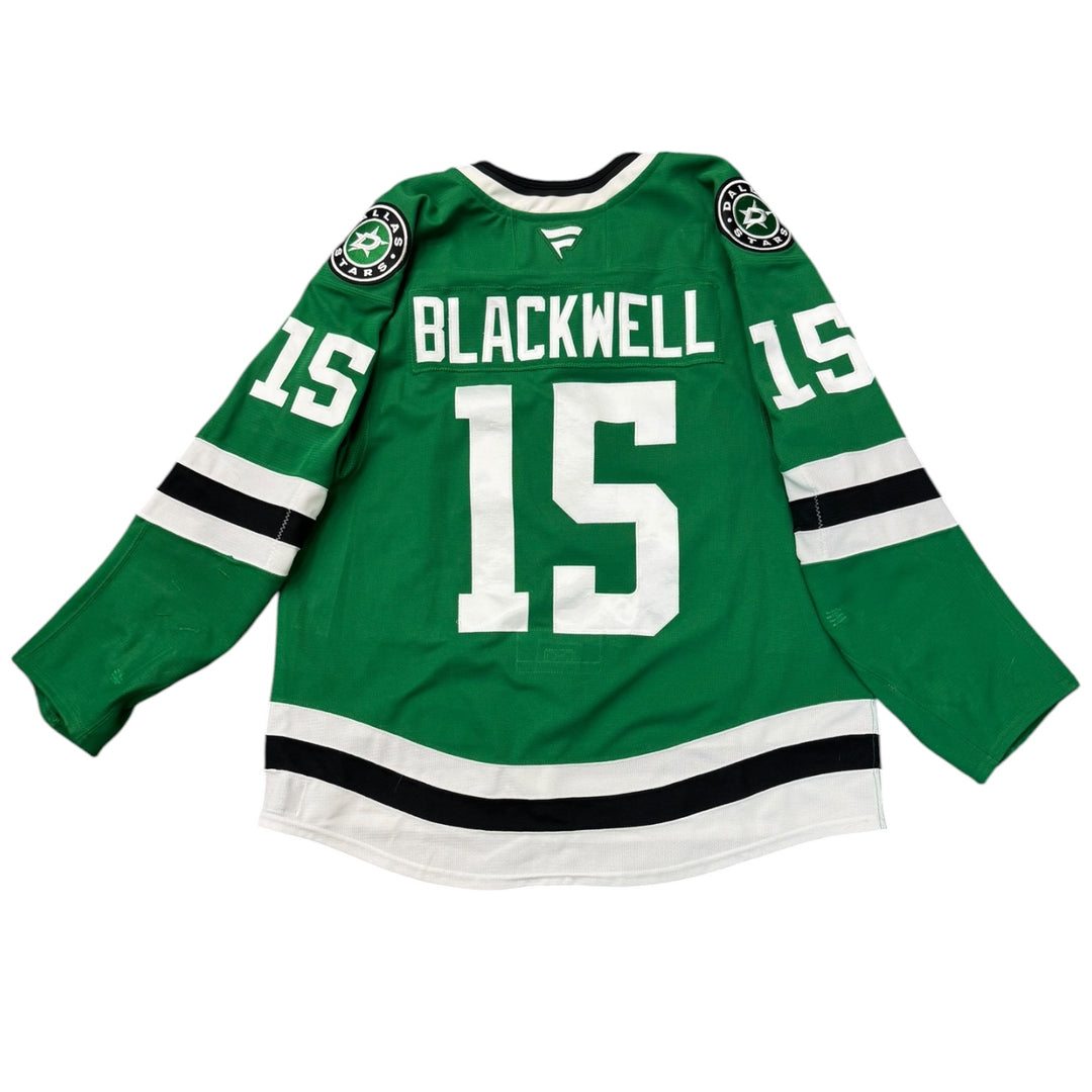 Game worn Dallas Stars home hockey jersey with 'Blackwell' and number '15' on a white background