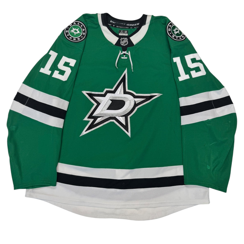 Game worn Dallas Stars home hockey jersey with number 15 on the sleeves and Stars logo across the chest. Jersey on a white background