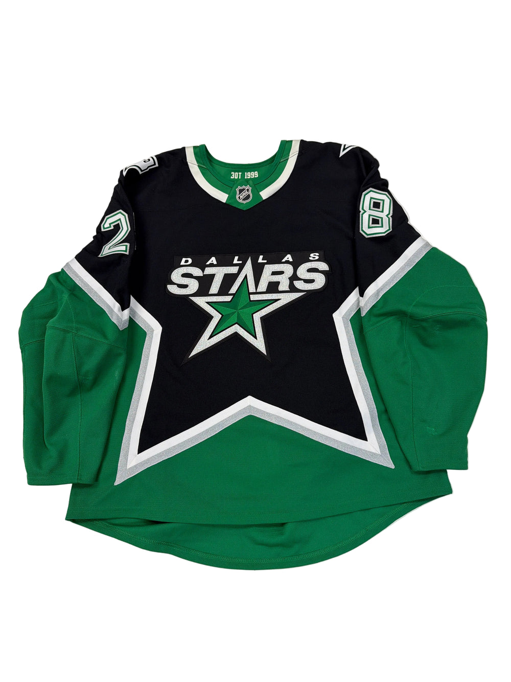 Green and black hoodie with star logo on a white surface