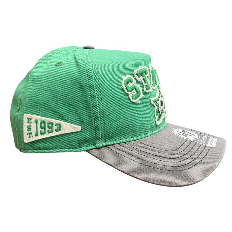 Dallas Stars green 47 Hitch adjustable cap featuring embroidered “STARS” lettering and Stars logo, a contrasting gray brim, and a vintage-inspired “EST. 1993” side patch.