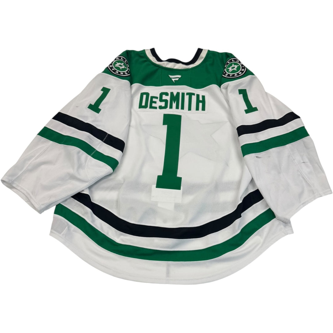 Game worn Dallas Stars away jersey. "DeSmith" and the Number 1 on the back. Jersey on a white background