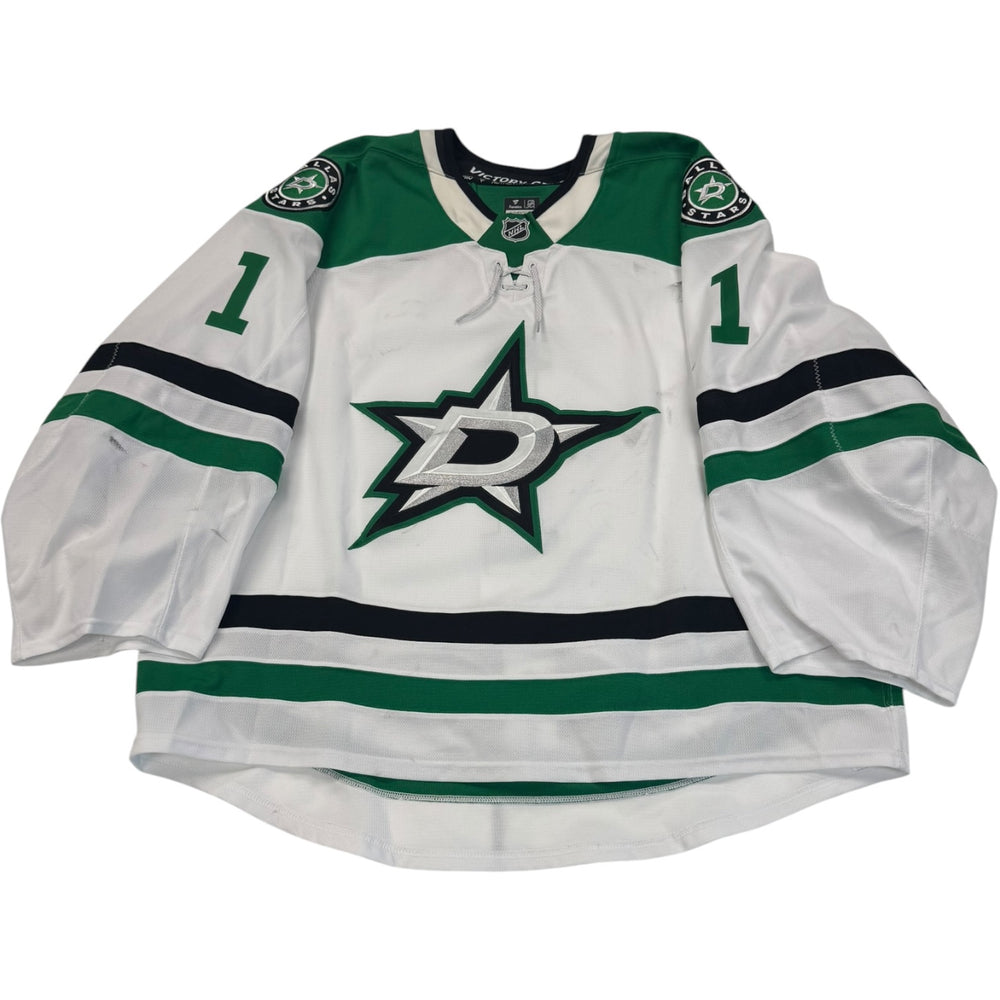 Game worn Dallas Stars Away jersey, number 1 on the sleeves with Dallas Stars logo on the chest. Hockey jersey on a white background
