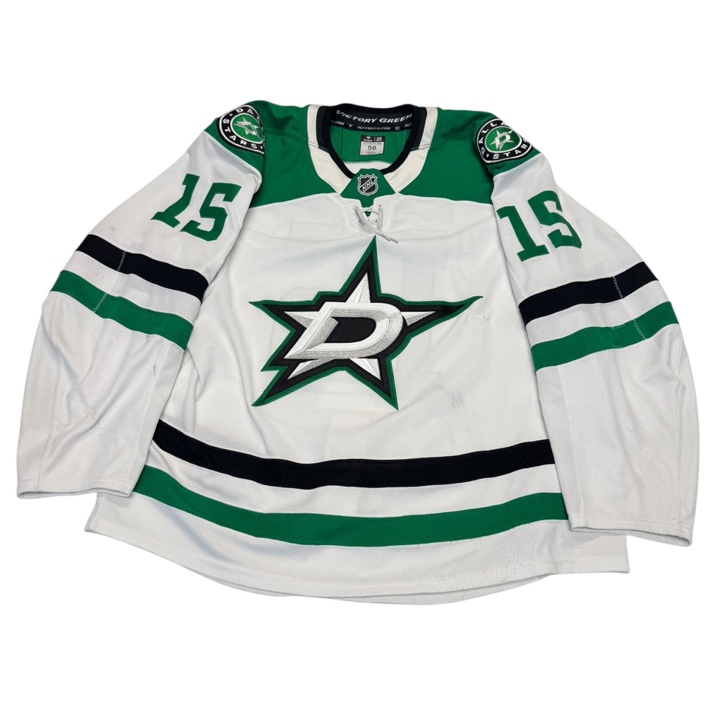 Game worn Dallas Stars Away jersey, number 15 on the sleeves with Dallas Stars logo on the chest. Hockey jersey on a white background
