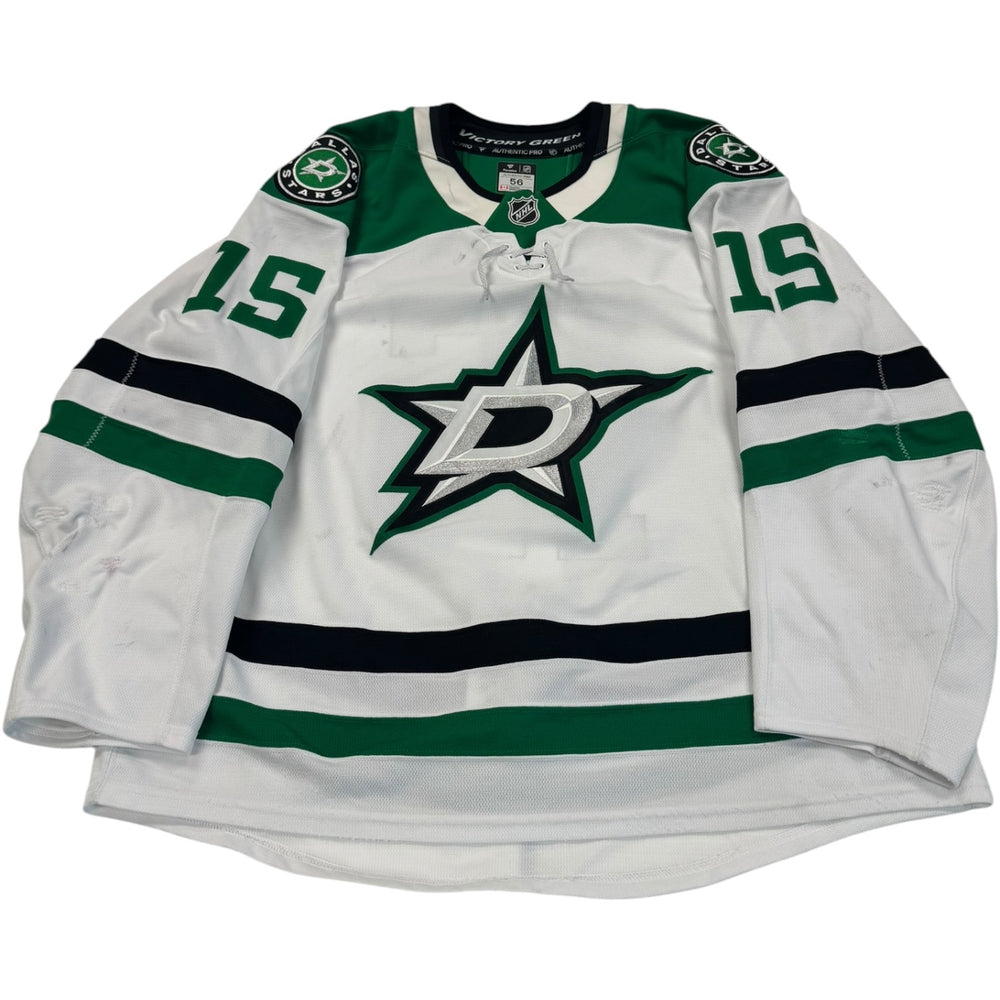 Game worn Dallas Stars Away jersey, number 15 on the sleeves with Dallas Stars logo on the chest. Hockey jersey on a white background

