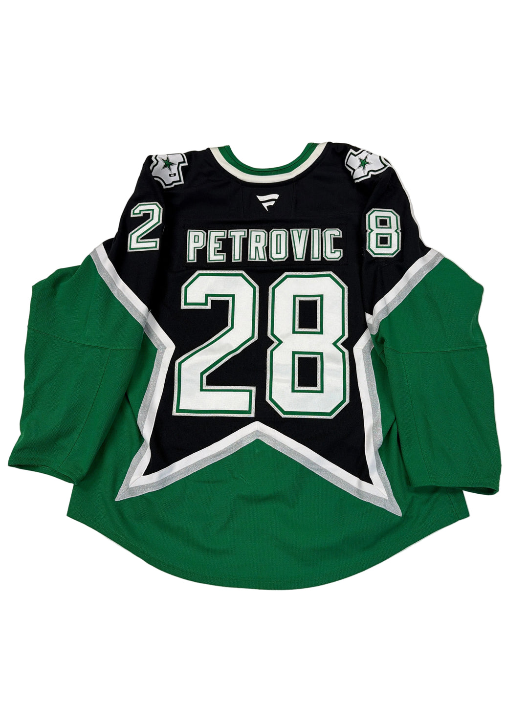 Green and black sports jersey with number 28 and name 'Petrovic' on a white surface.