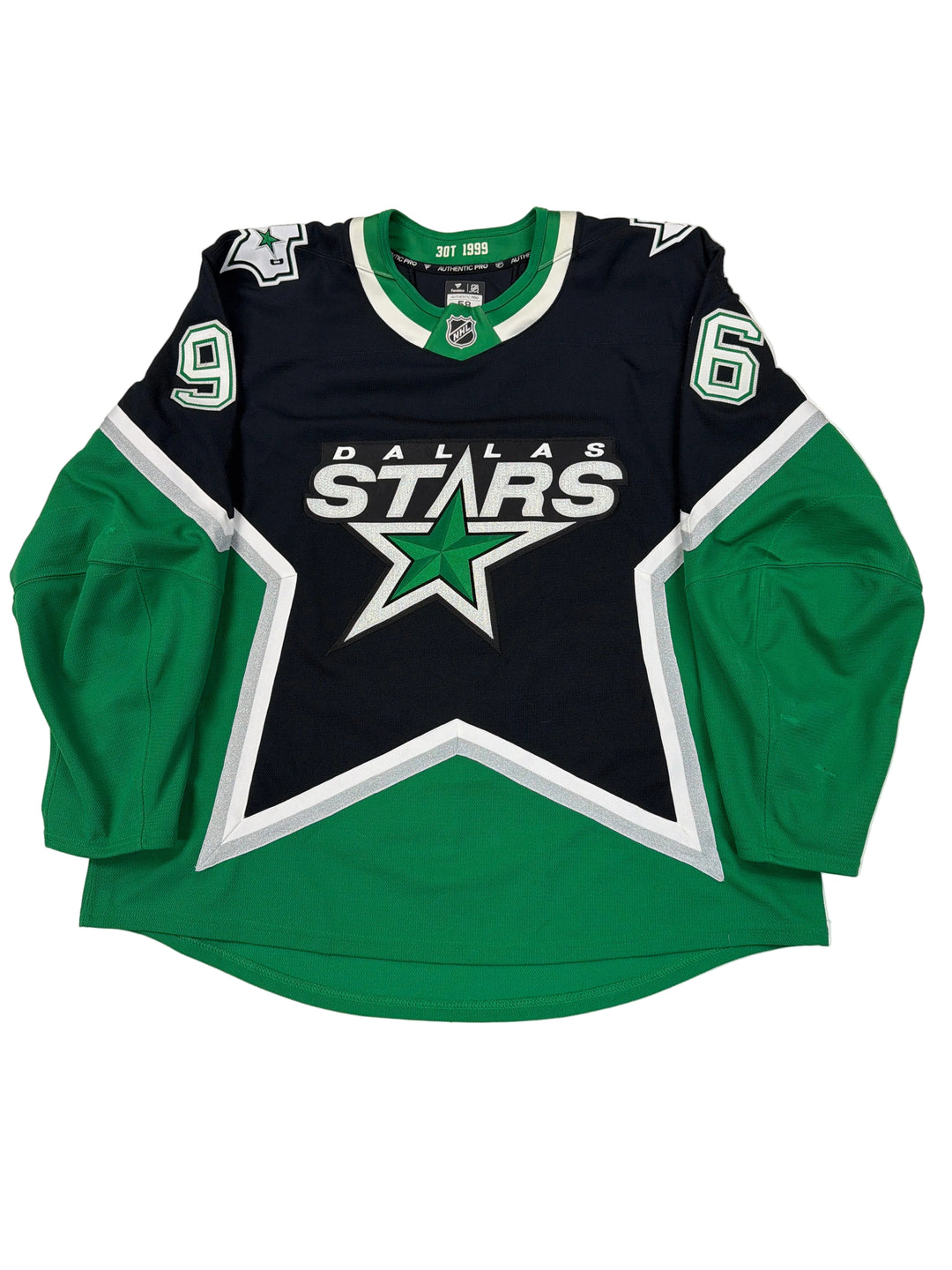 Green and black sports jersey with star logo on a white surface