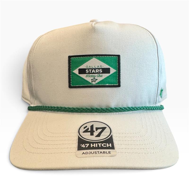 A cream-colored snapback cap with a green braided rope detail across the brim and a green &