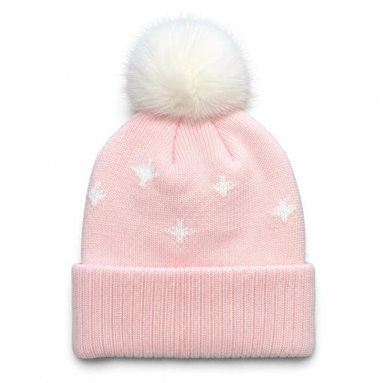 A light pink knit beanie hat with a fluffy white pom-pom on top and small white embroidered star patterns, shown against a plain white background.
