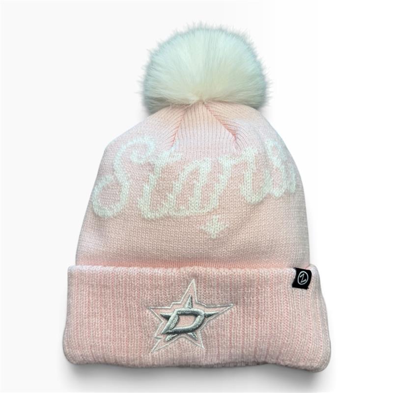 A light pink knit pom-pom beanie featuring a white cursive &
