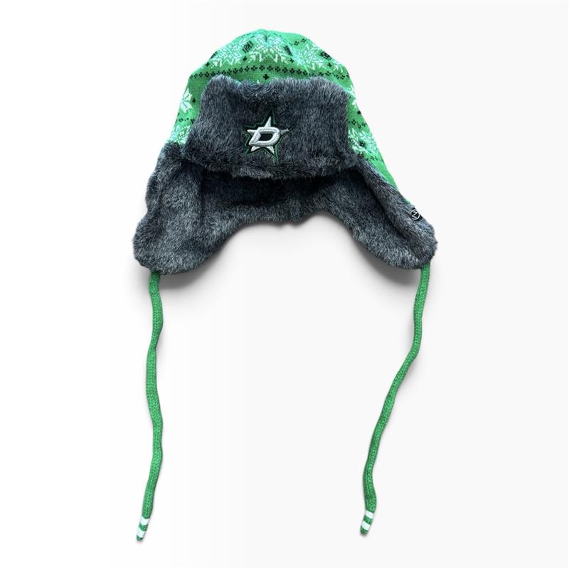 A Dallas Stars hat featuring a green knitted snowflake crown, a dark gray faux-fur ear flaps, and green strings with white tips, shown on a plain white background.