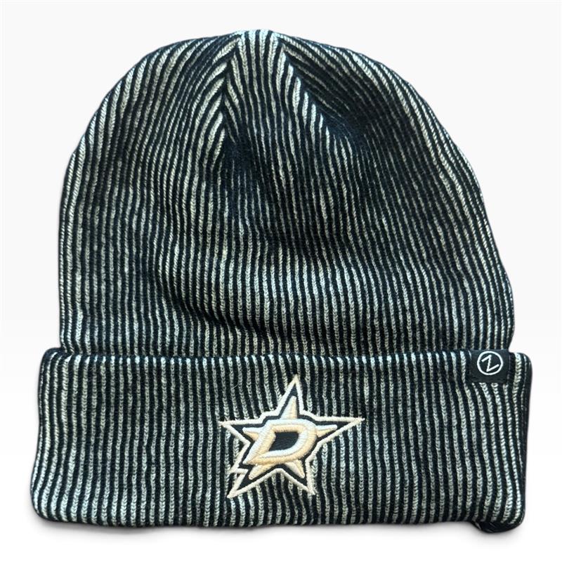 A black and white vertically striped knit beanie with a folded cuff, featuring an embroidered Dallas Stars logo in gold and white on the front and a small black &
