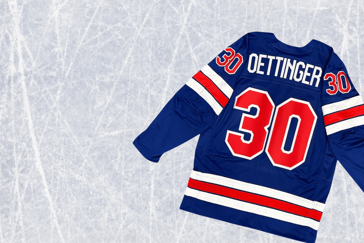 Hockey jersey with number 30 and name 'Oettinger' on a textured white background