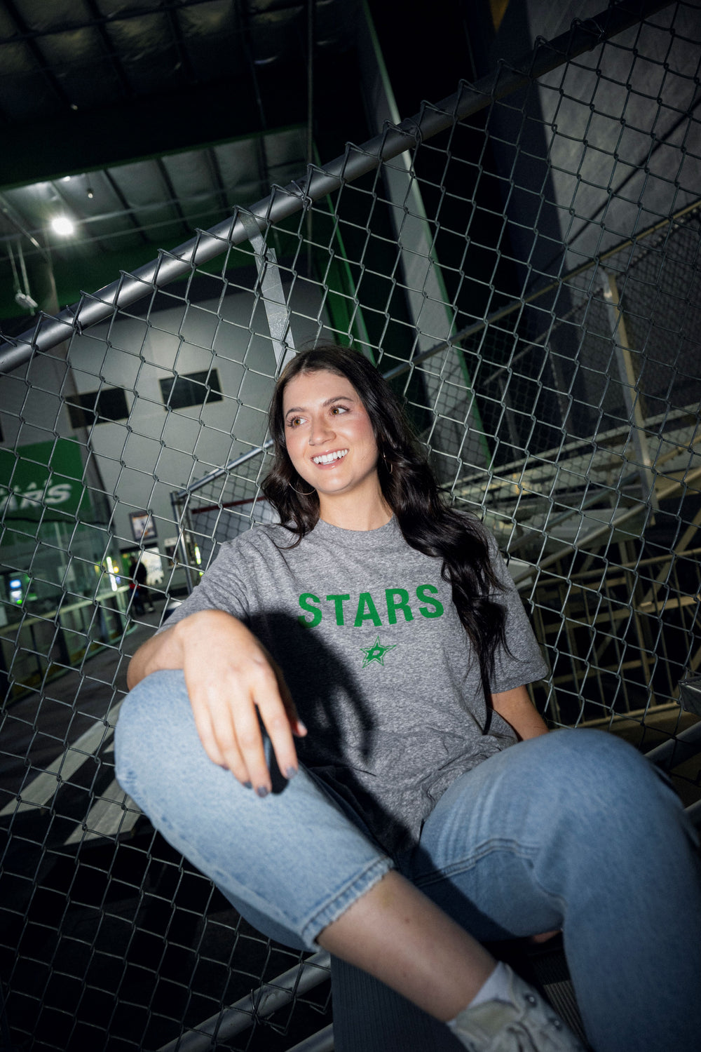 Person wearing a gray 'STARS' Line Change t-shirt