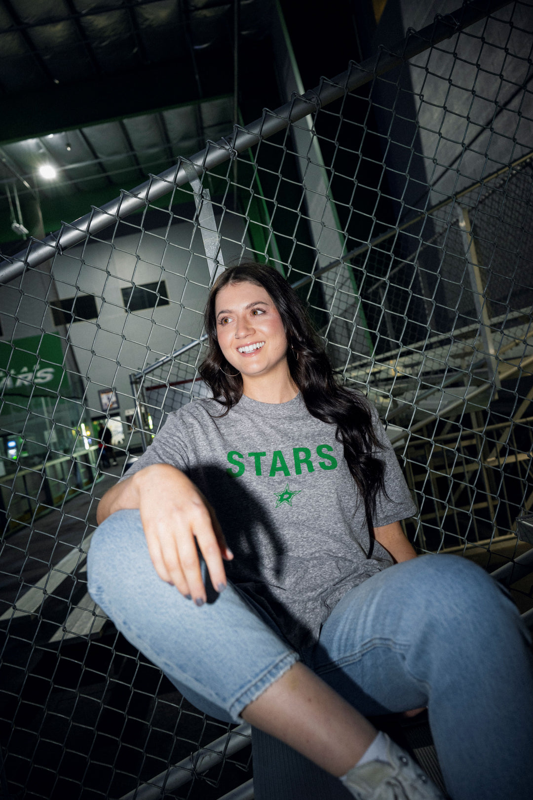 Person wearing a gray 'STARS' Line Change t-shirt