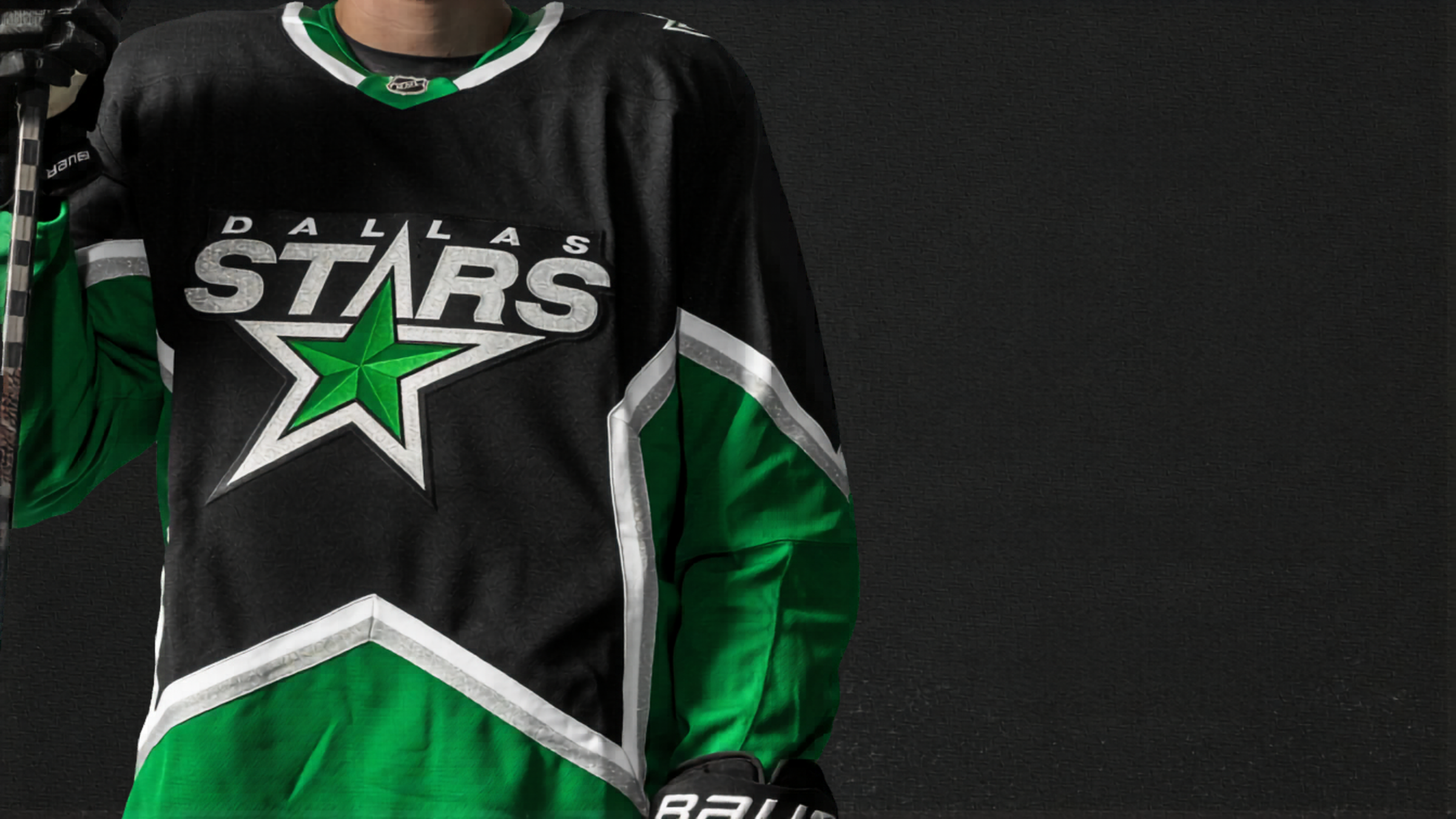 Hockey jersey with 'Dallas Stars' logo on a black background