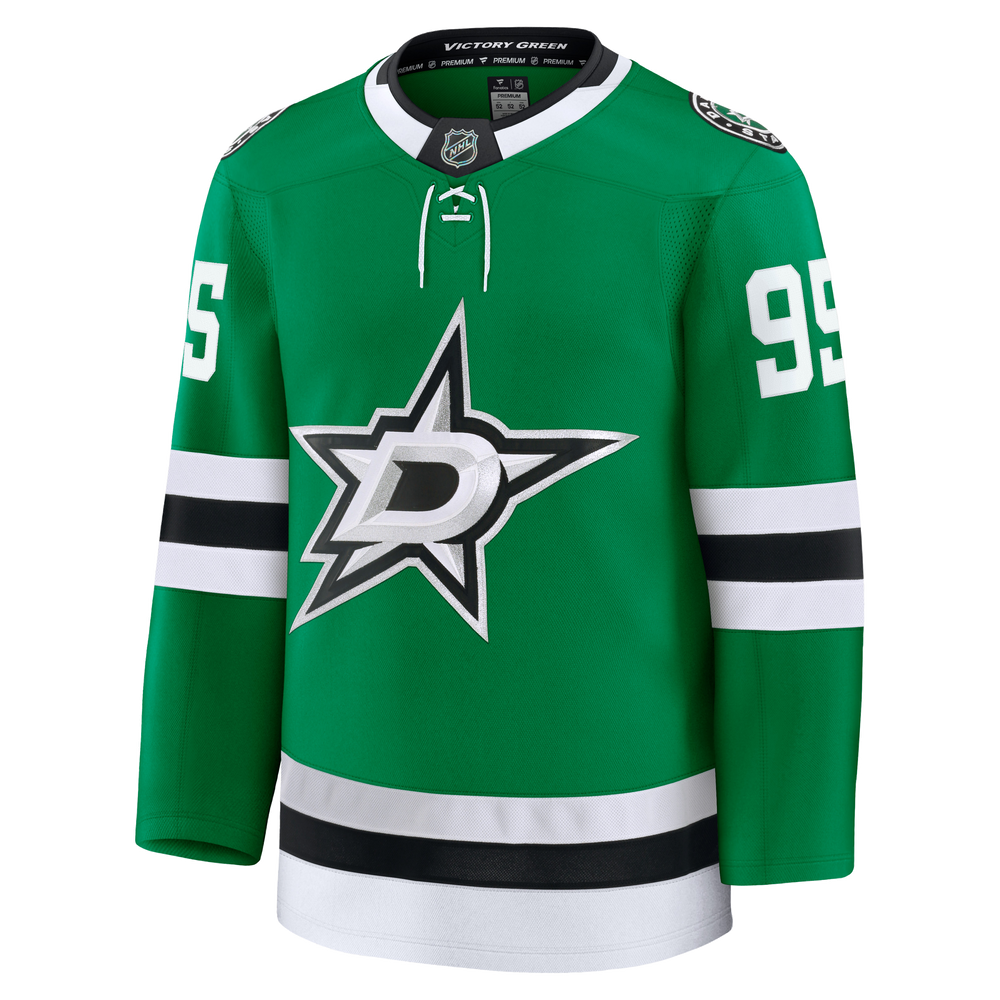 A green Dallas Stars hockey jersey with white and black accents, featuring the team's star logo on the chest and the number 95 on the sleeve.