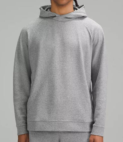 Photo of Lululemon model wearing Textured Double-Knit Cotton Hoodie in Grey