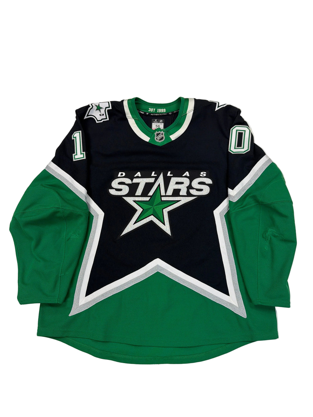 Green and black hoodie with star logo on a white surface