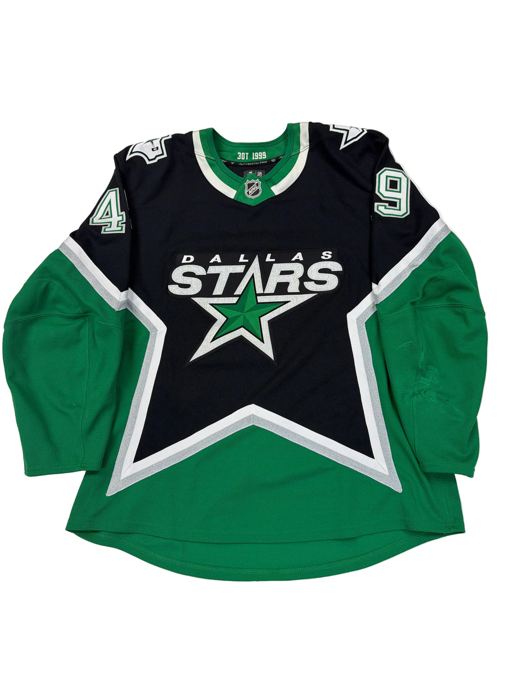 Hockey jersey with a star design on a white surface
